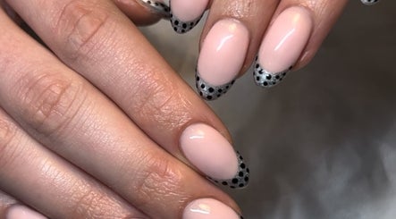 Chic polka dot nail art manicure at CW and Co in Melbourne, Victoria, AU offering premium beauty services.
