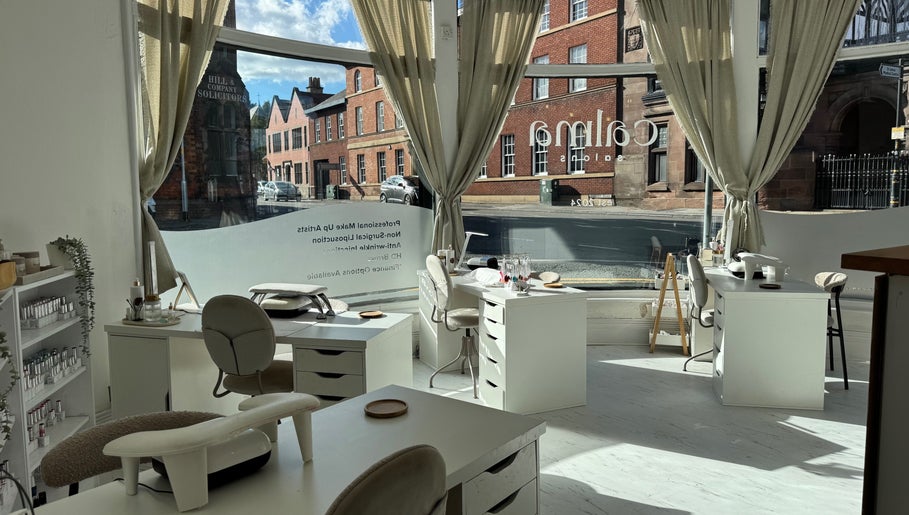 Bright interior of Calma Salons- Altrincham, showcasing elegant nail stations in Altrincham, England, GB.