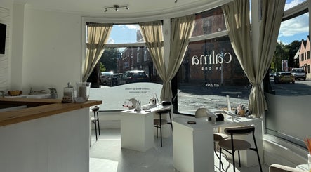 Bright, elegant interior of Calma Salons- Altrincham in Altrincham, England, GB with inviting beauty stations.