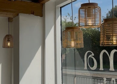 Elegant hanging lights at calma salons - Chester, enhancing the tranquil ambiance in Chester, England, GB.