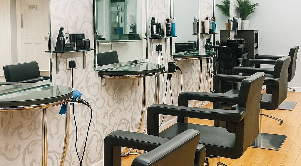 Modern salon chairs and styling stations at Chy Blew (House Of Hair) in Bude, England, GB.