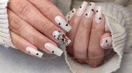 Stylish nail art with heart design at Cherry Blossom, Gönyeli, TR. Perfect for a chic look.