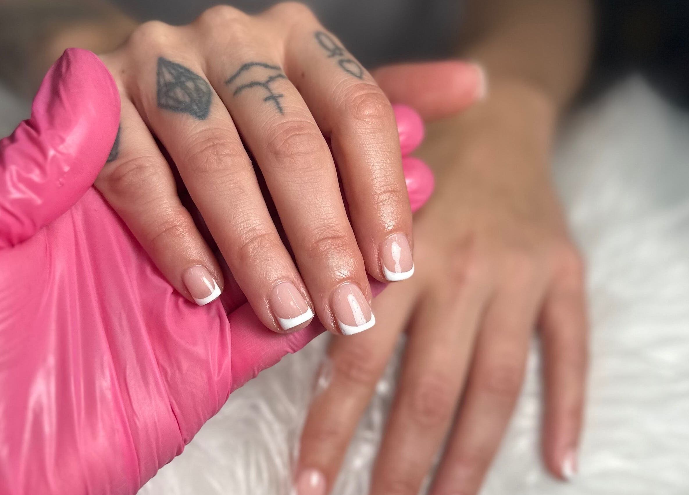 French manicure at Pretty and Polished in Sandy, England, GB, showcasing elegant nails.