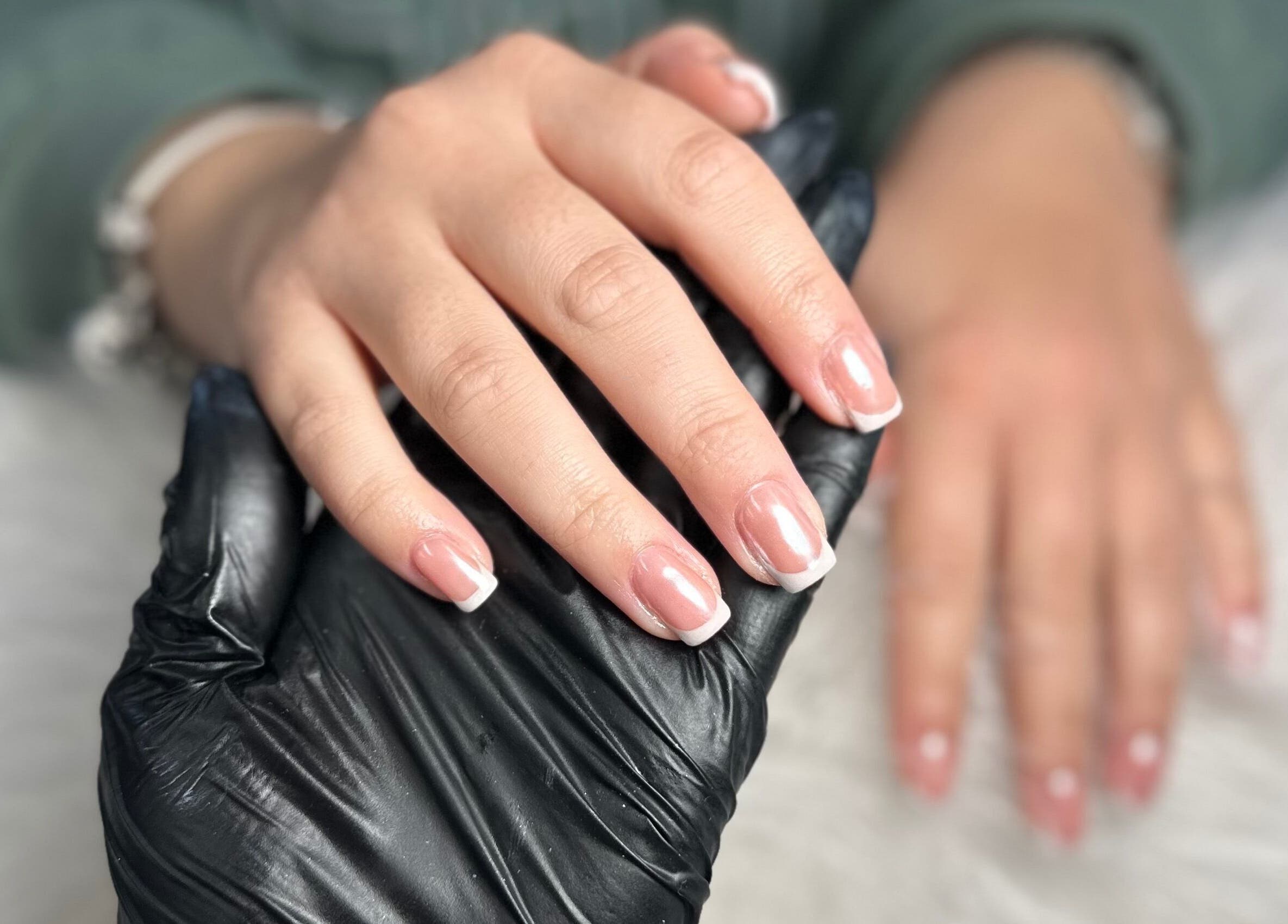 French manicure at Pretty and Polished in Sandy, England, GB. Professional nail care services.