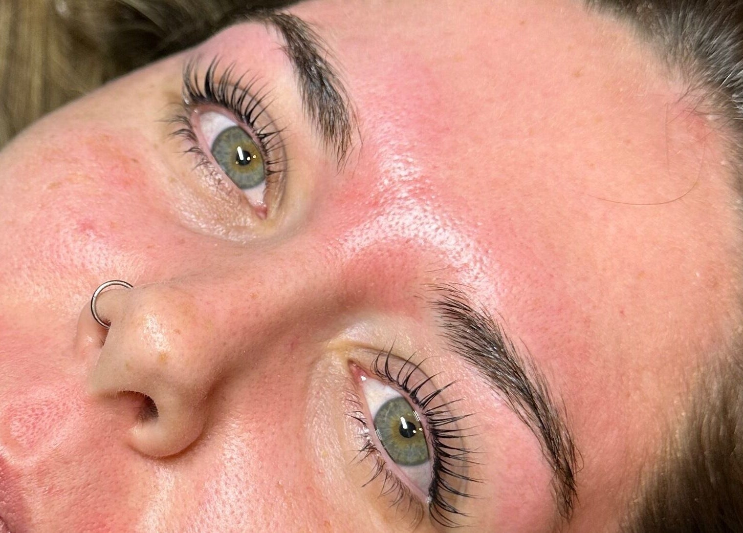 Close-up of a refreshed face after treatment at Pretty and Polished, Sandy, England, GB.