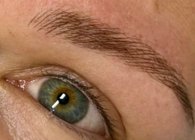 Close-up of a perfectly shaped eyebrow at Cosmetic Artistry by Letitia, Brisbane, Queensland, AU.
