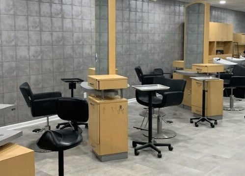 Interior of Gemini Hair Studio in Randolph, New Jersey, featuring modern styling chairs and workstations.
