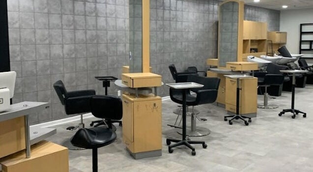 Interior of Gemini Hair Studio in Randolph, New Jersey, featuring modern styling chairs and workstations.