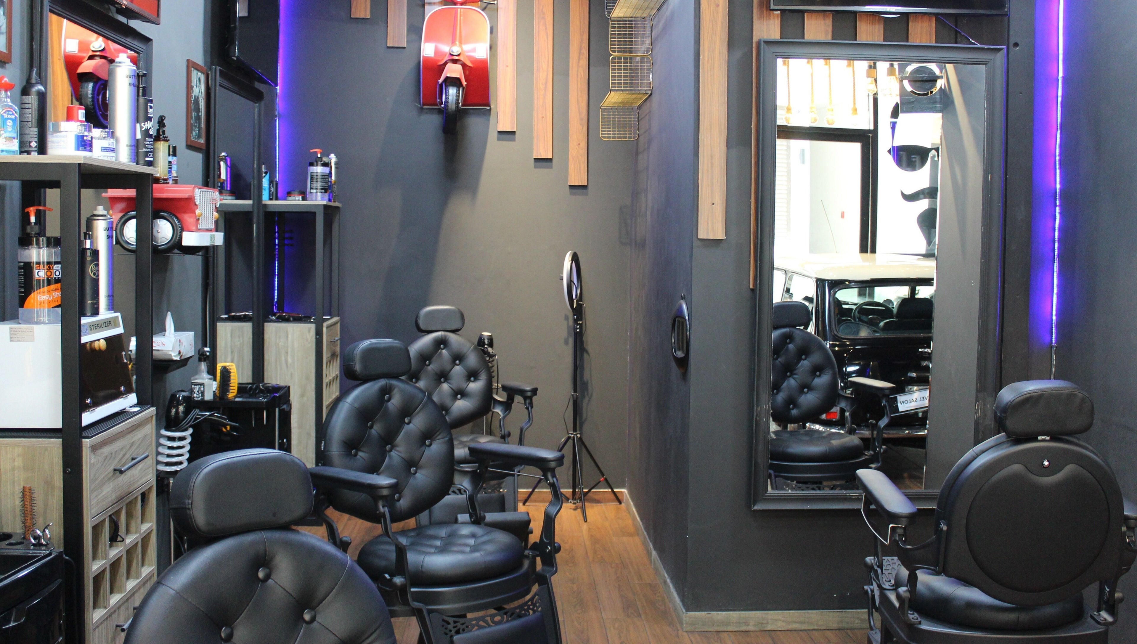 Modern interior at Black Level Gent's Salon, Dubai, Dubai, AE, featuring stylish barber chairs and decor.