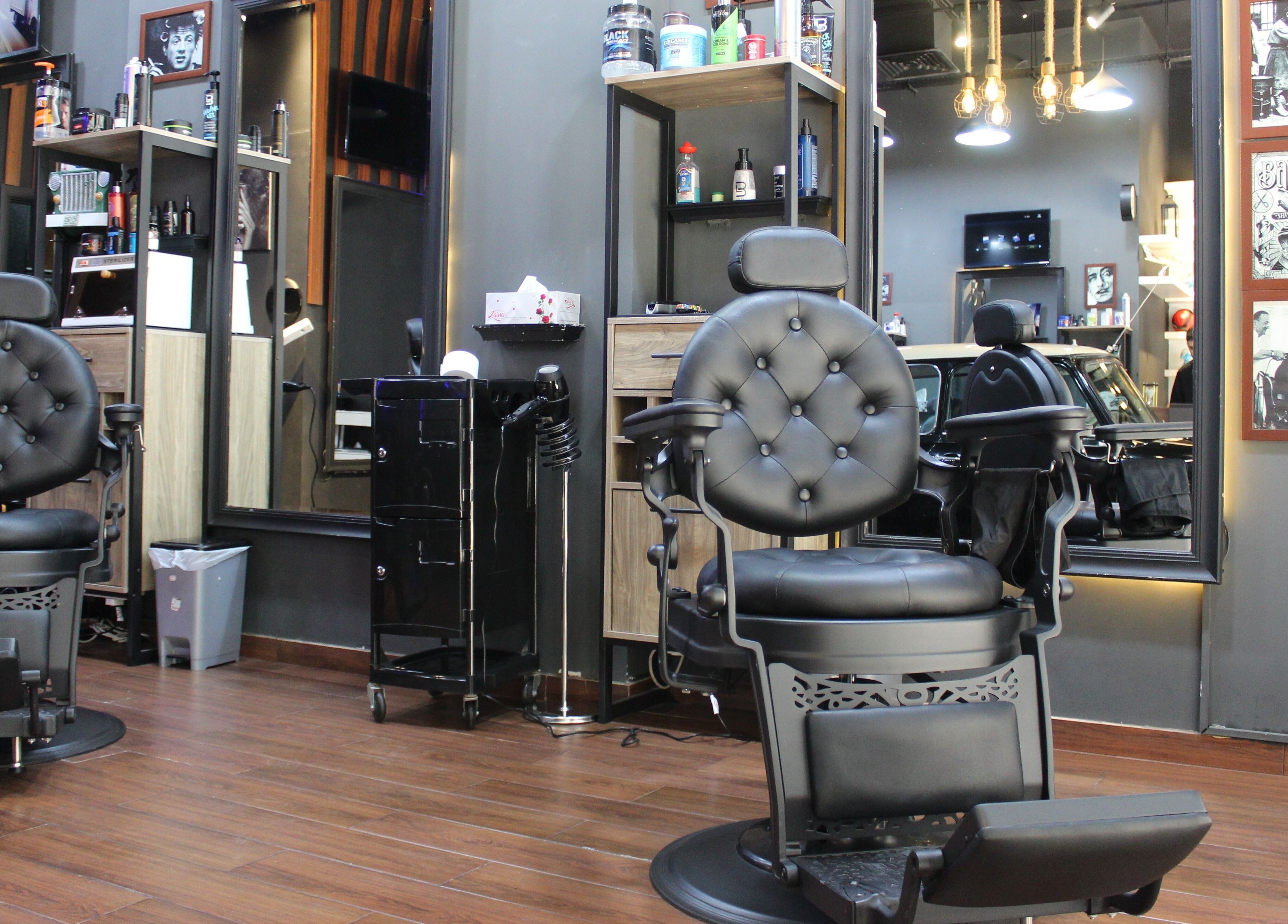 Elegant barber chairs at Black Level Gent's Salon, Dubai, Dubai, AE, showcasing modern masculine style.