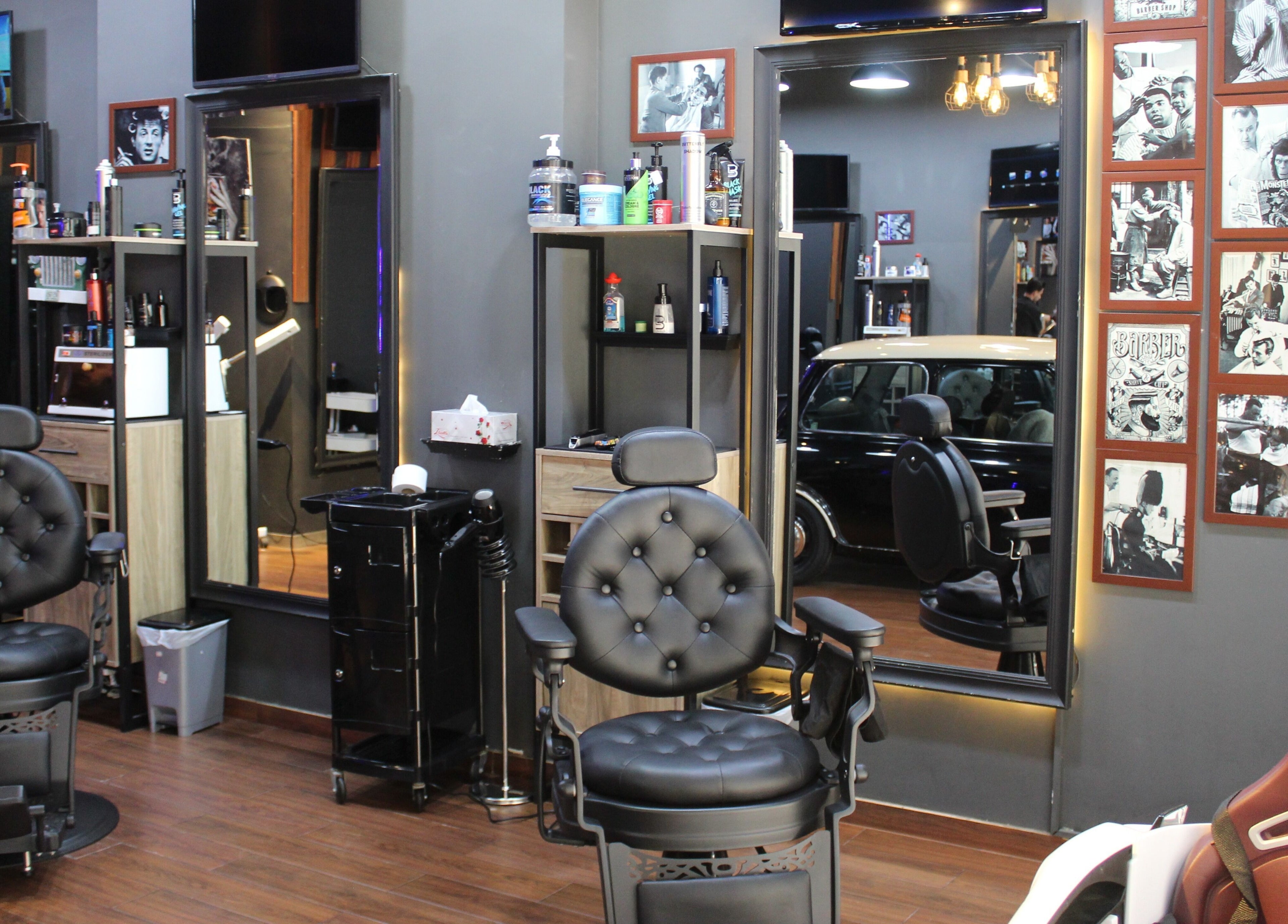 Interior of Black Level Gent's Salon in Dubai, Dubai, AE, featuring classic barber chairs and grooming tools.