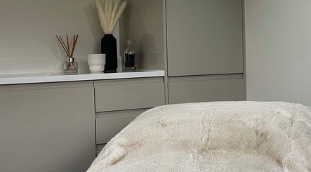 Tranquil treatment room at Beauty by Maisy York with plush bed and modern decor in York, England, GB.