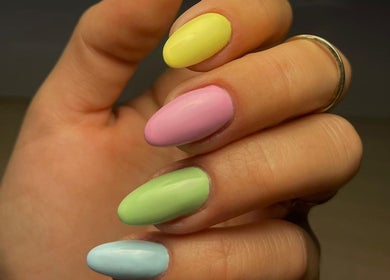 Colorful manicured nails at S&M beauty and nails, Qawra, Malta, MT showcasing vibrant design.