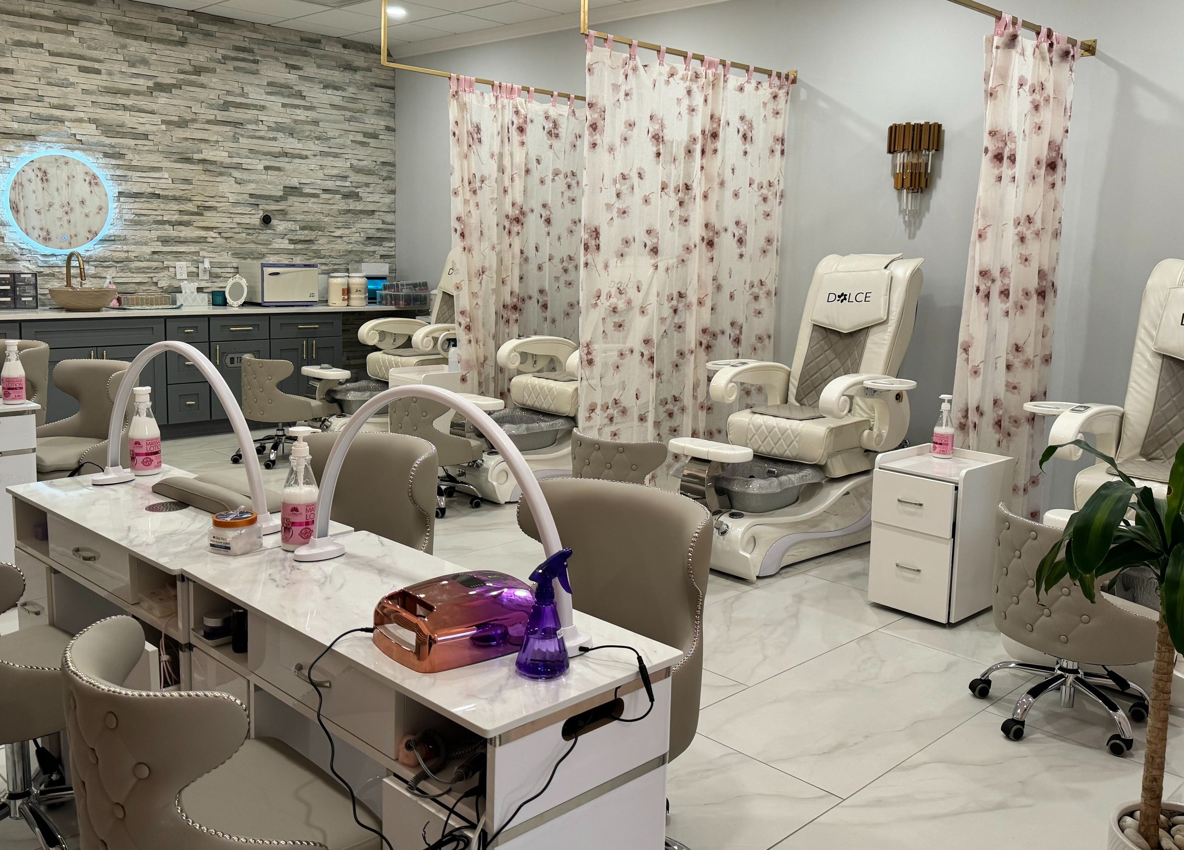 Chic interior of Dolce Lash Beauty Lounge in Washington Township, NJ, featuring luxurious pedicure stations.