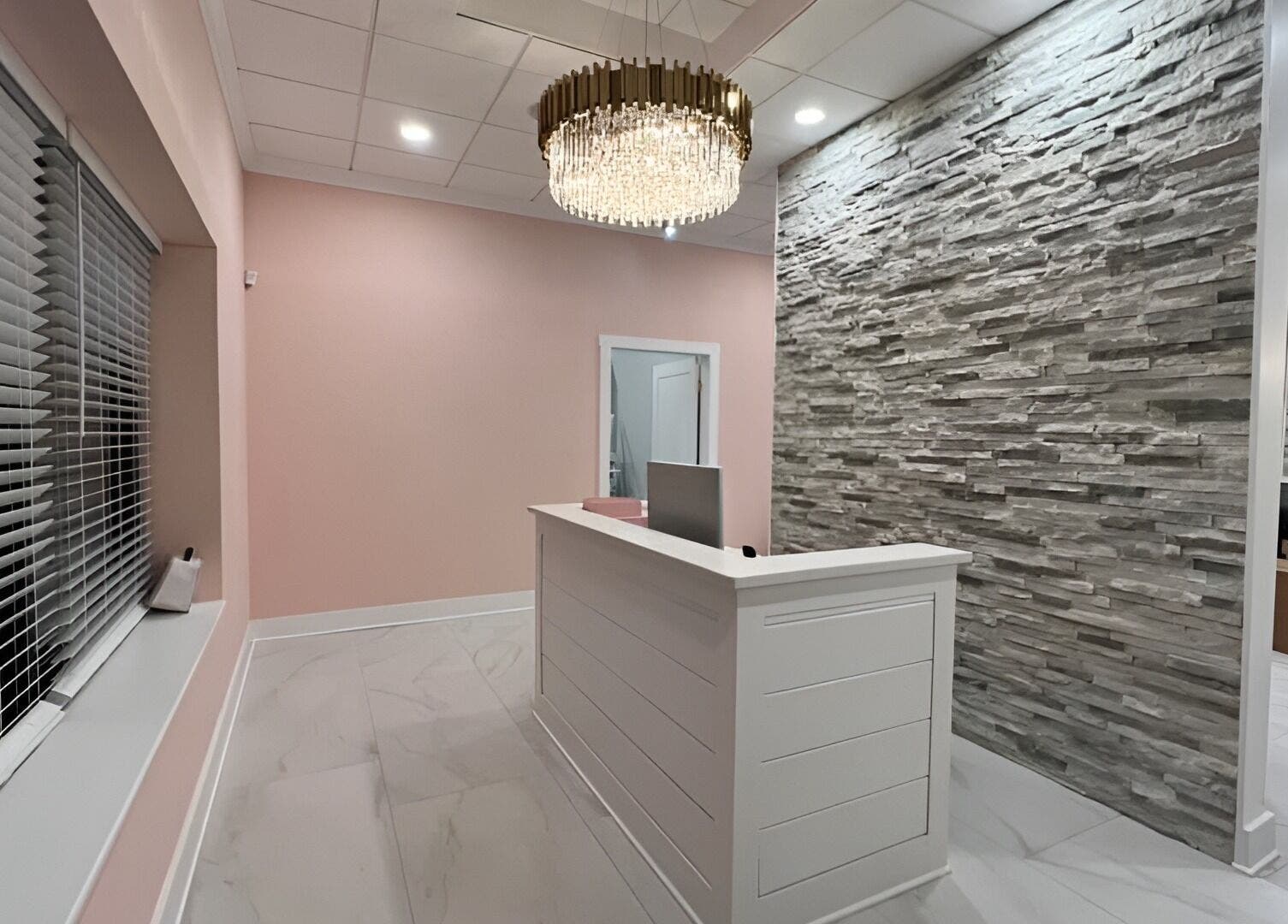 Modern reception area at Dolce Lash Beauty Lounge, Washington Township, New Jersey, US featuring elegant lighting.
