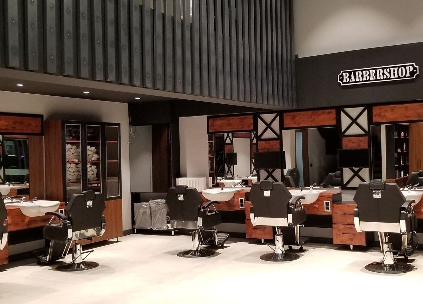 Modern and sleek interior at Alkent Erkek Kuafor in İstanbul, İstanbul, TR.