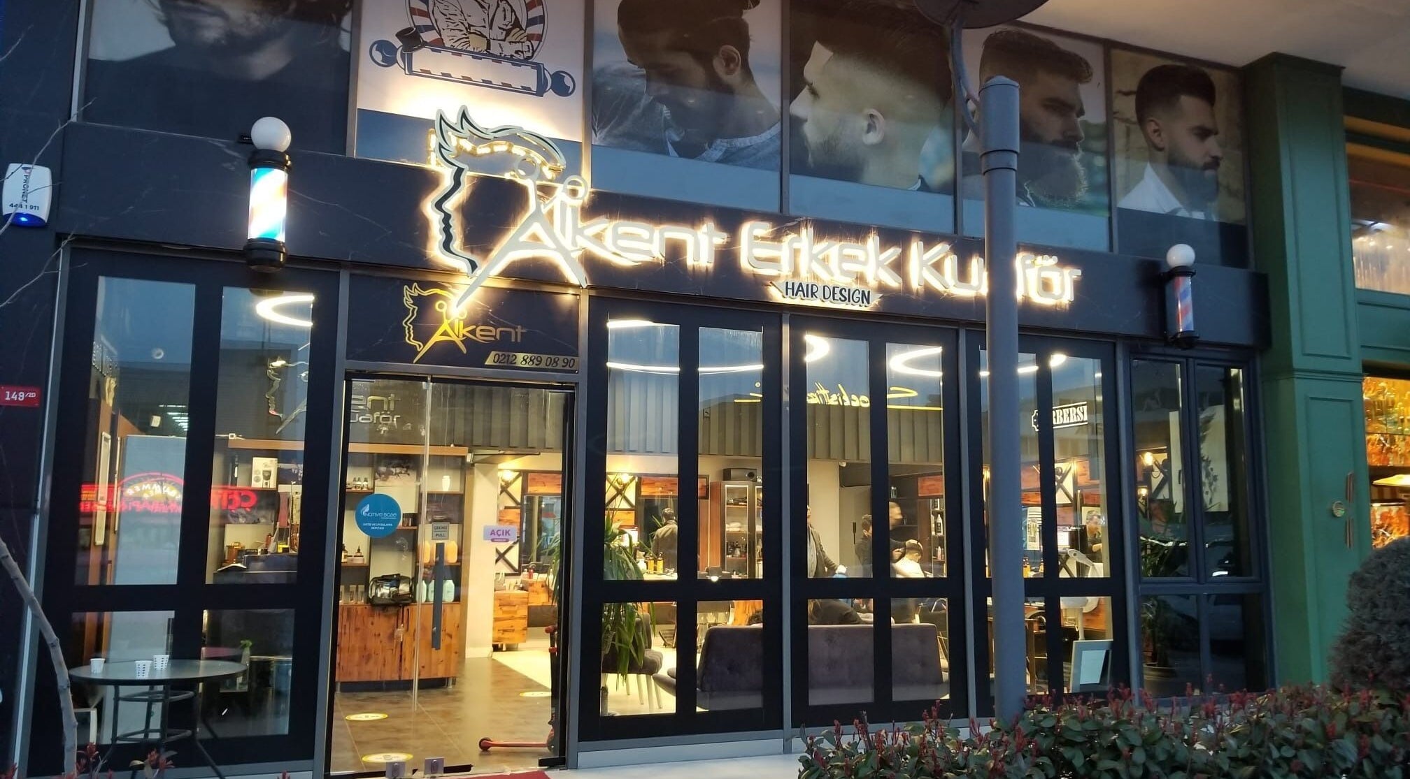 Front view of Alkent Erkek Kuafor in İstanbul, İstanbul, TR showcasing modern salon design.