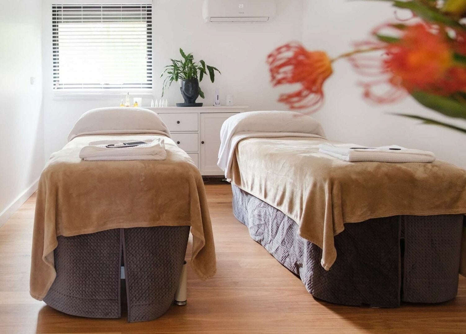 Relaxing massage room at Chimes Day Spa, Denmark, Western Australia, AU with two treatment beds.