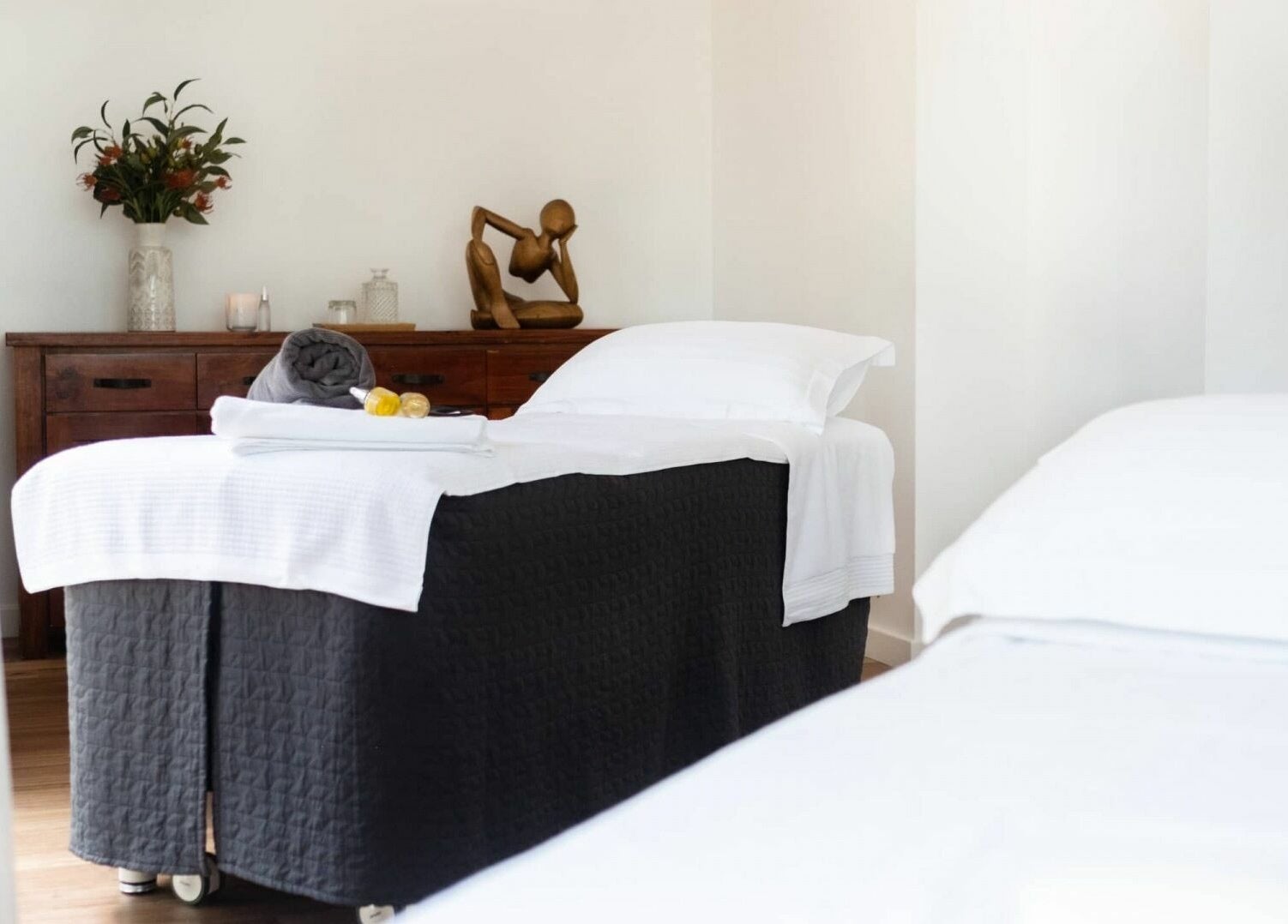 Tranquil treatment room at Chimes Day Spa, Denmark, Western Australia, AU. Features massage table and decor.