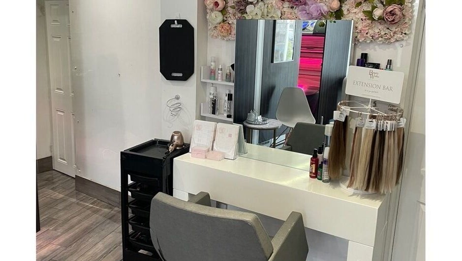 Chic interior of Scarletts Hair salon in Rochester, England, GB featuring stylish hair extension bar and decor.