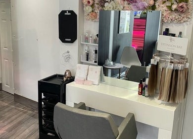 Chic interior of Scarletts Hair salon in Rochester, England, GB featuring stylish hair extension bar and decor.
