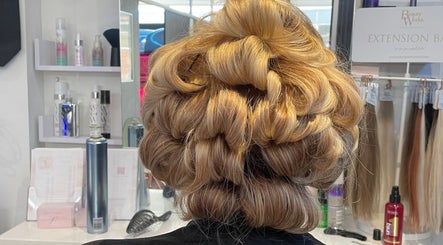 Stylish hair updo crafted at Scarletts Hair, Rochester, England, GB showcasing intricate styling.