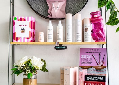 Beauty products display at UC Hair, Risdon Vale, Tasmania, AU featuring NAK haircare and Lash-V kits.