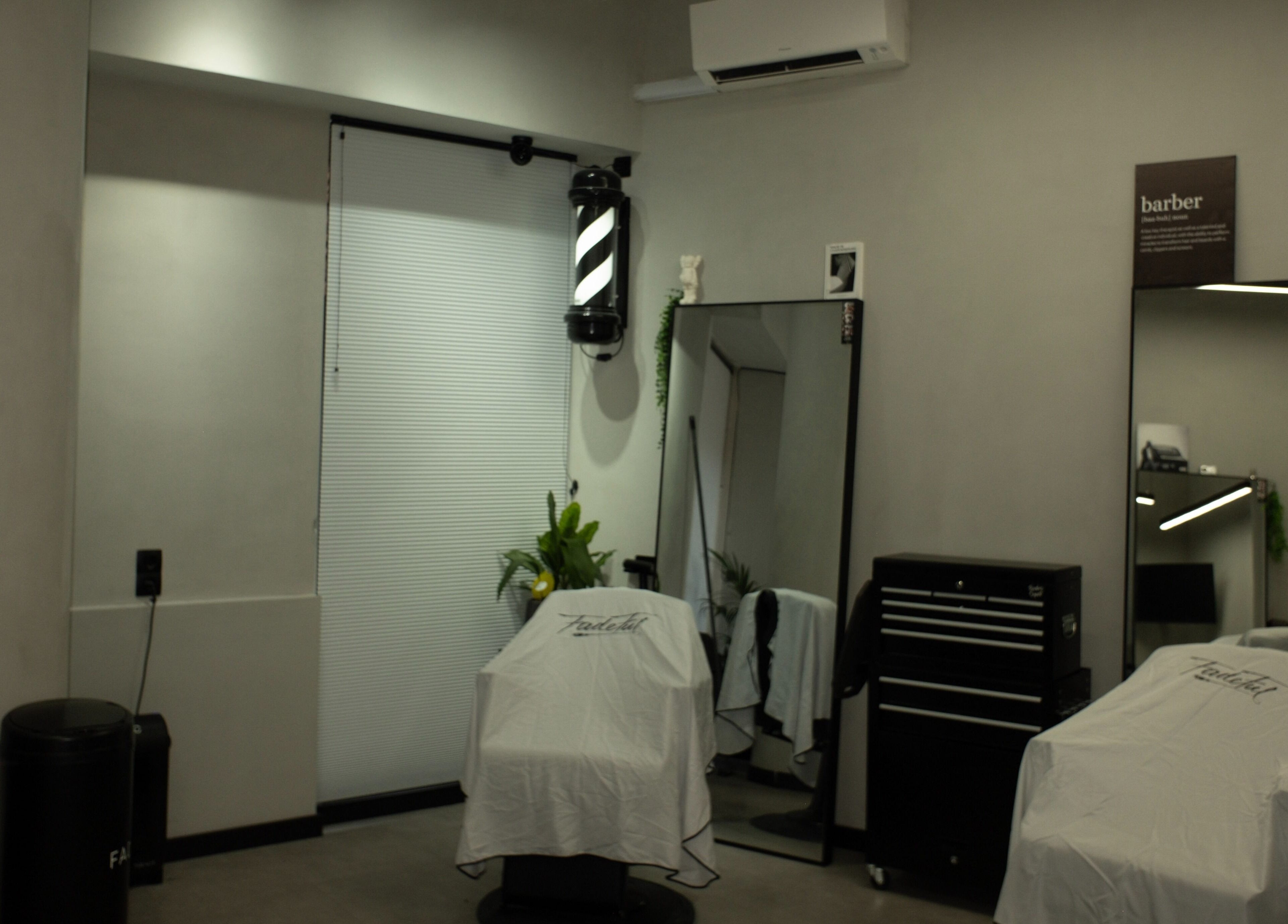 Modern barbershop chair at Fadeful Barbershop, Almere, Flevoland, NL, with stylish decor and pristine setup.