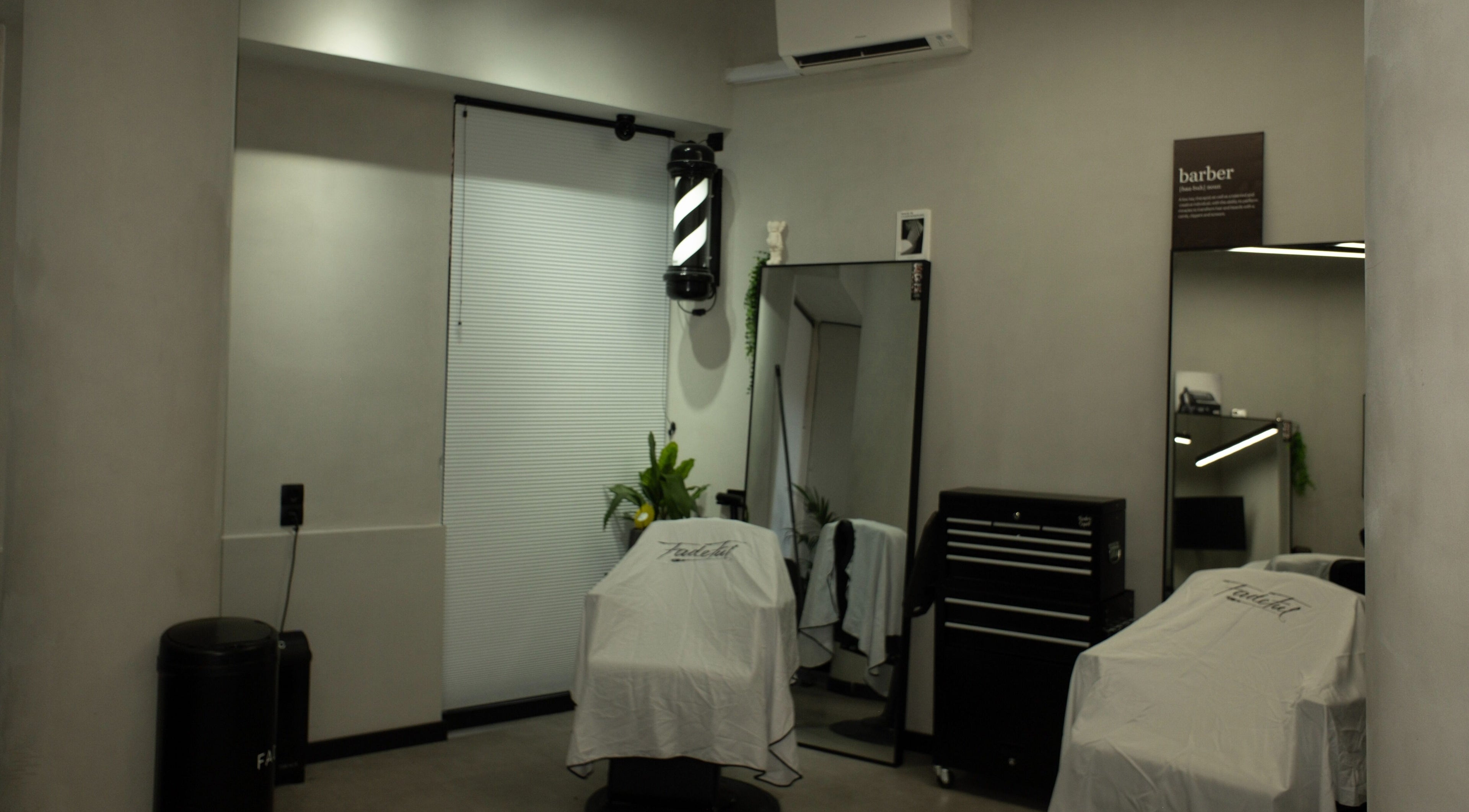 Modern barbershop chair at Fadeful Barbershop, Almere, Flevoland, NL, with stylish decor and pristine setup.