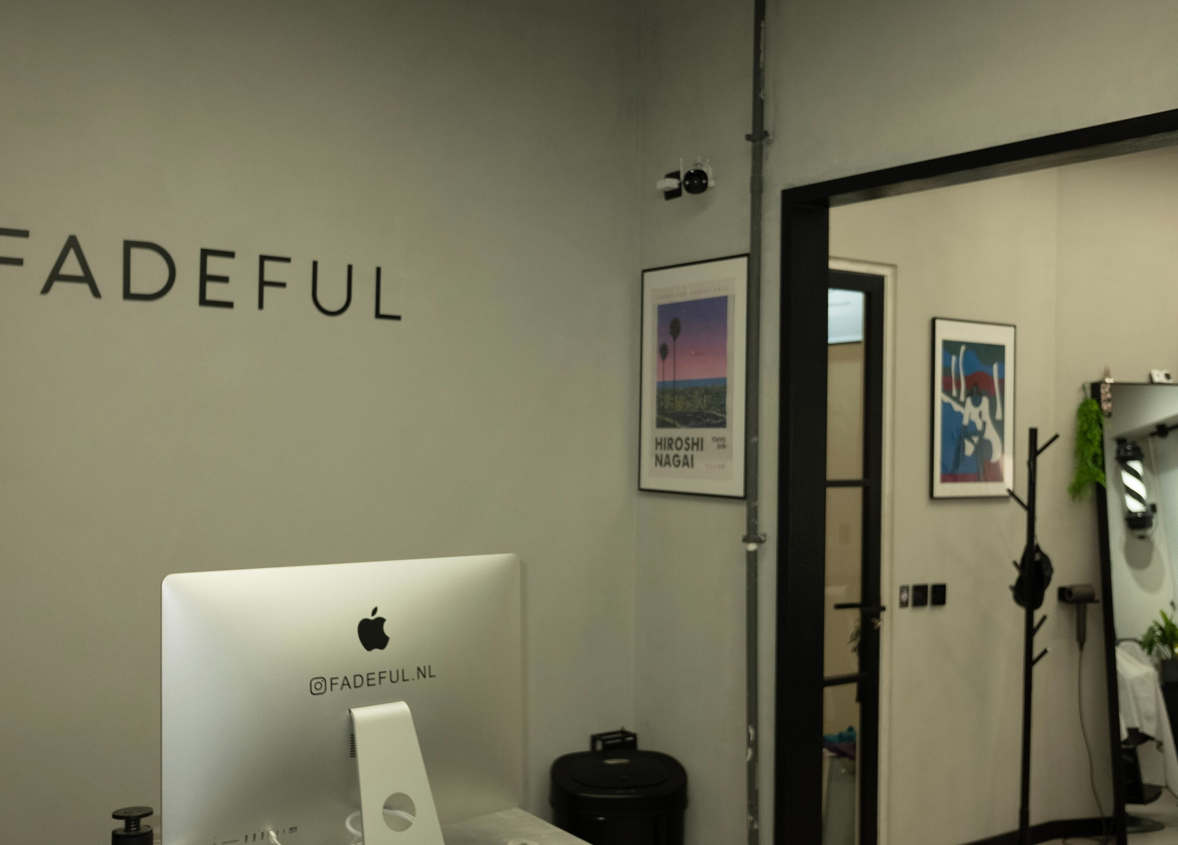 Modern interior of Fadeful Barbershop in Almere, Flevoland, NL showcasing sleek design and professional setup.