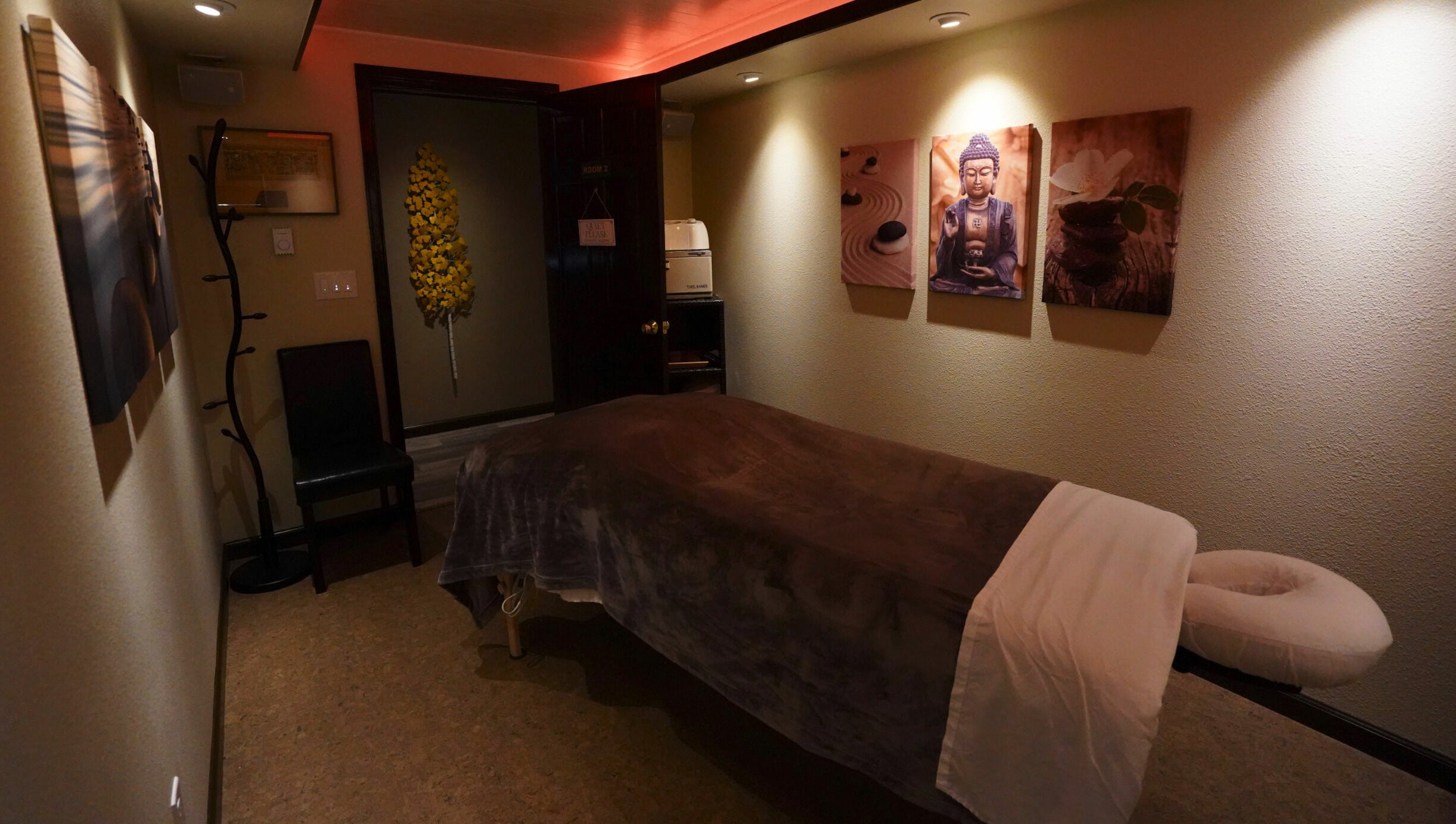 Relaxing massage room at Mt. Royal Spa in Frisco, Colorado, US with calming decor and ambient lighting.