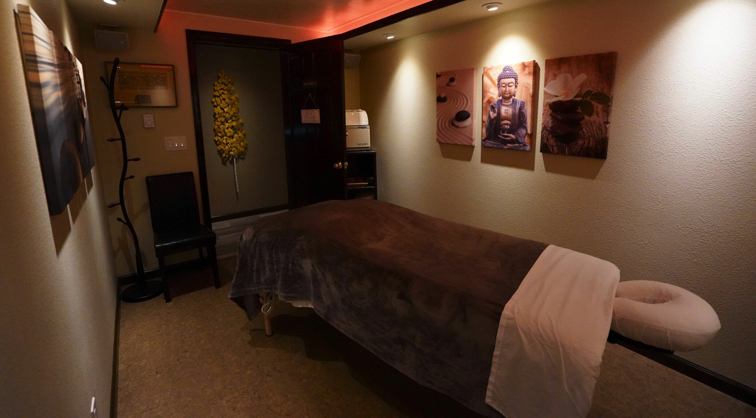 Relaxing massage room at Mt. Royal Spa in Frisco, Colorado, US with calming decor and ambient lighting.