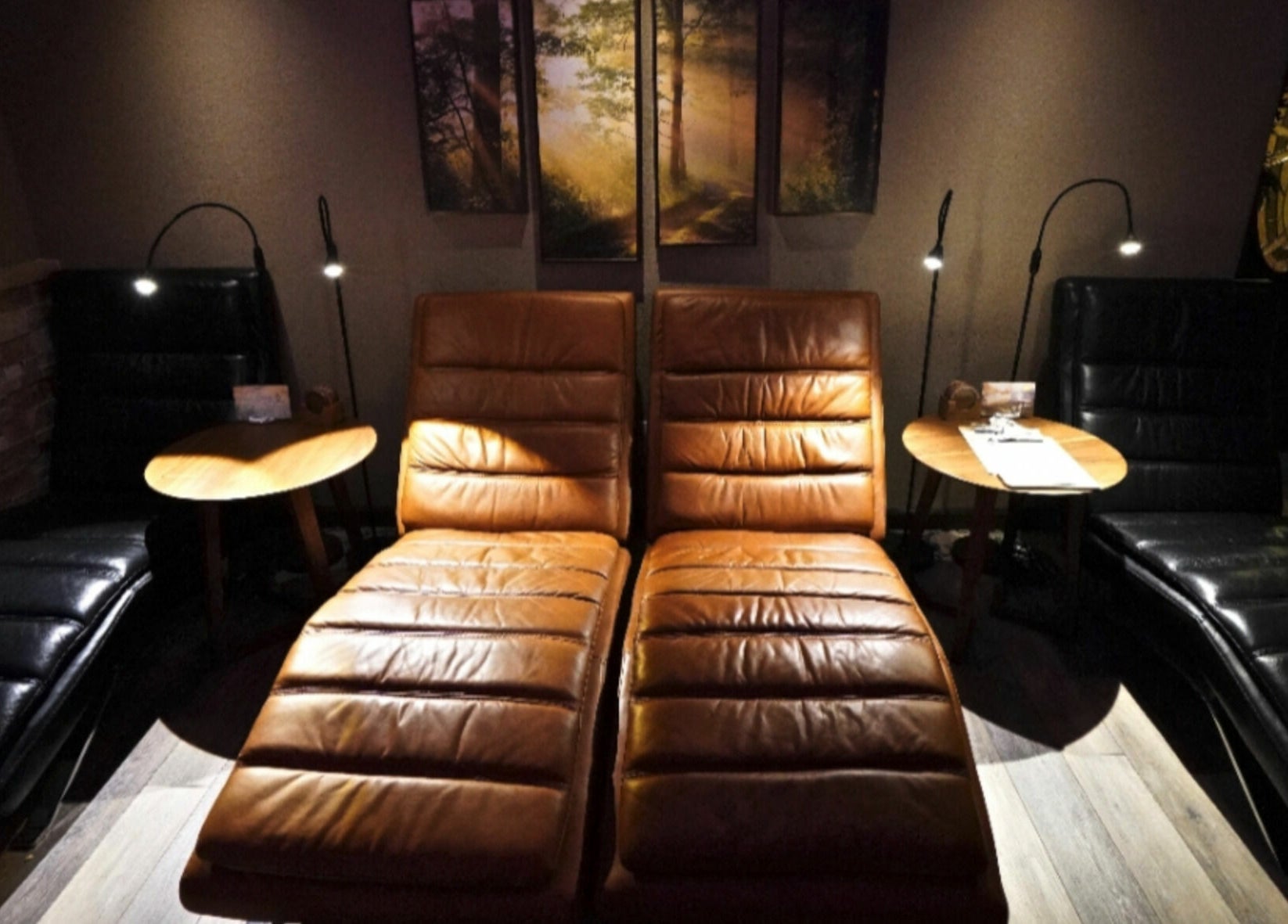 Relaxing lounge area with leather chairs at Mt. Royal Spa, Frisco, Colorado, US.