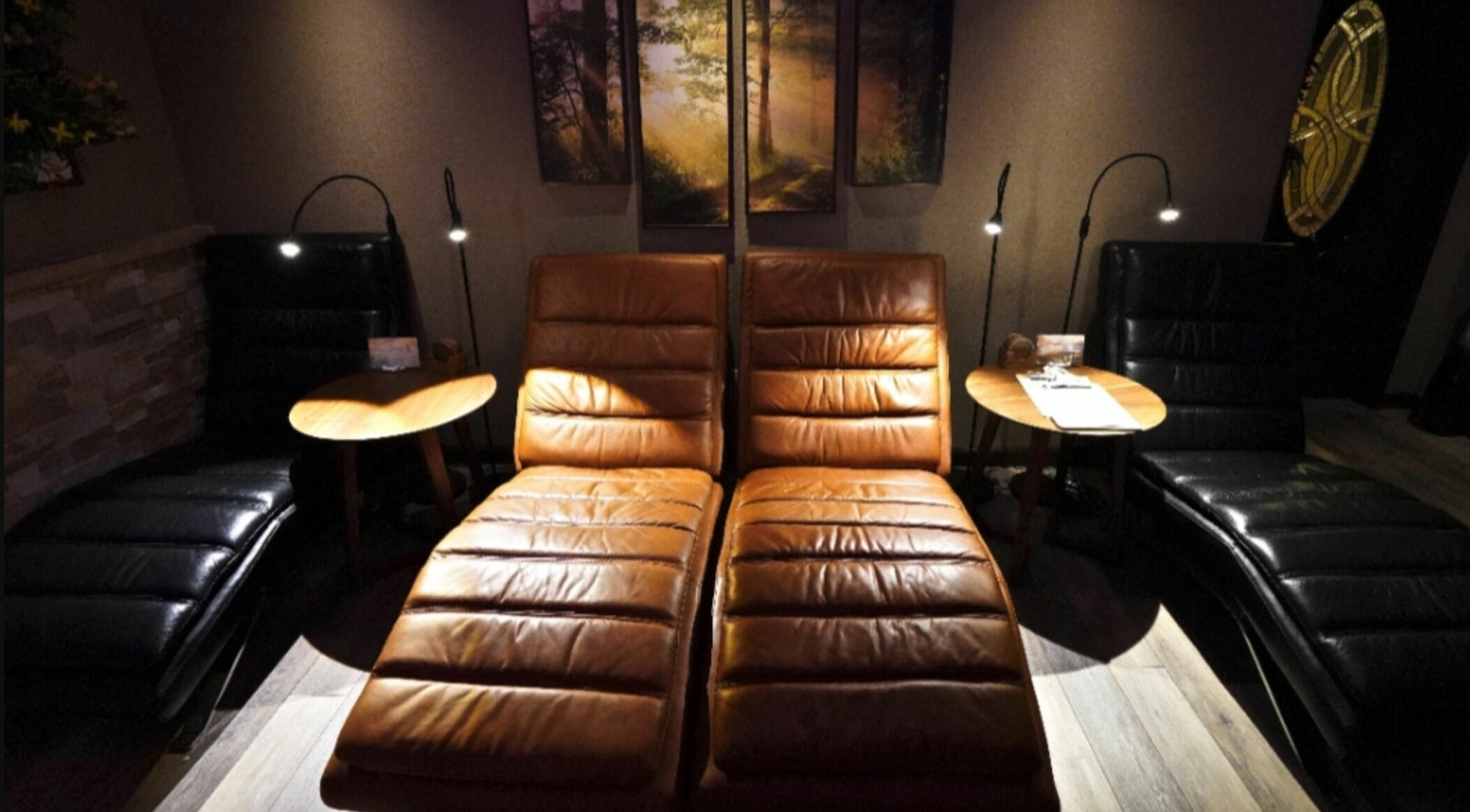 Relaxing lounge area with leather chairs at Mt. Royal Spa, Frisco, Colorado, US.
