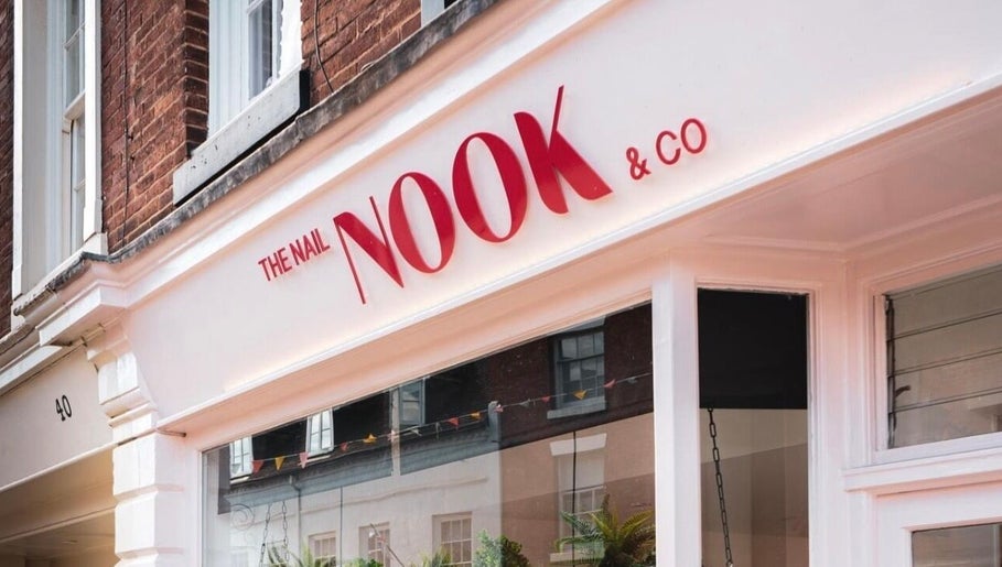 Front of Nics Nails storefront in Shrewsbury, England, GB showcasing elegant signage.