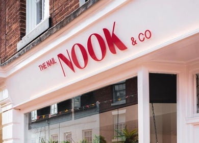 Front of Nics Nails storefront in Shrewsbury, England, GB showcasing elegant signage.
