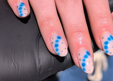 Stylish blue dotted nails design at Nics Nails, Shrewsbury, England, GB.