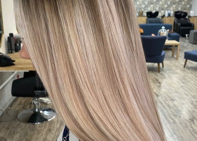 Smooth blonde hair transformation at Hello Happiness Hair (by Elrae), Cape Town, Western Cape, ZA.