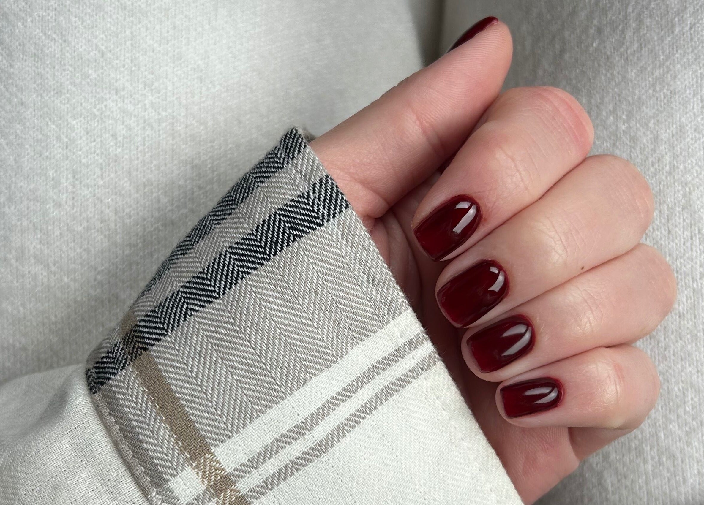 Deep red manicured nails at Manicured By Amelia in Cannock, England, GB. Elegant and stylish finish.