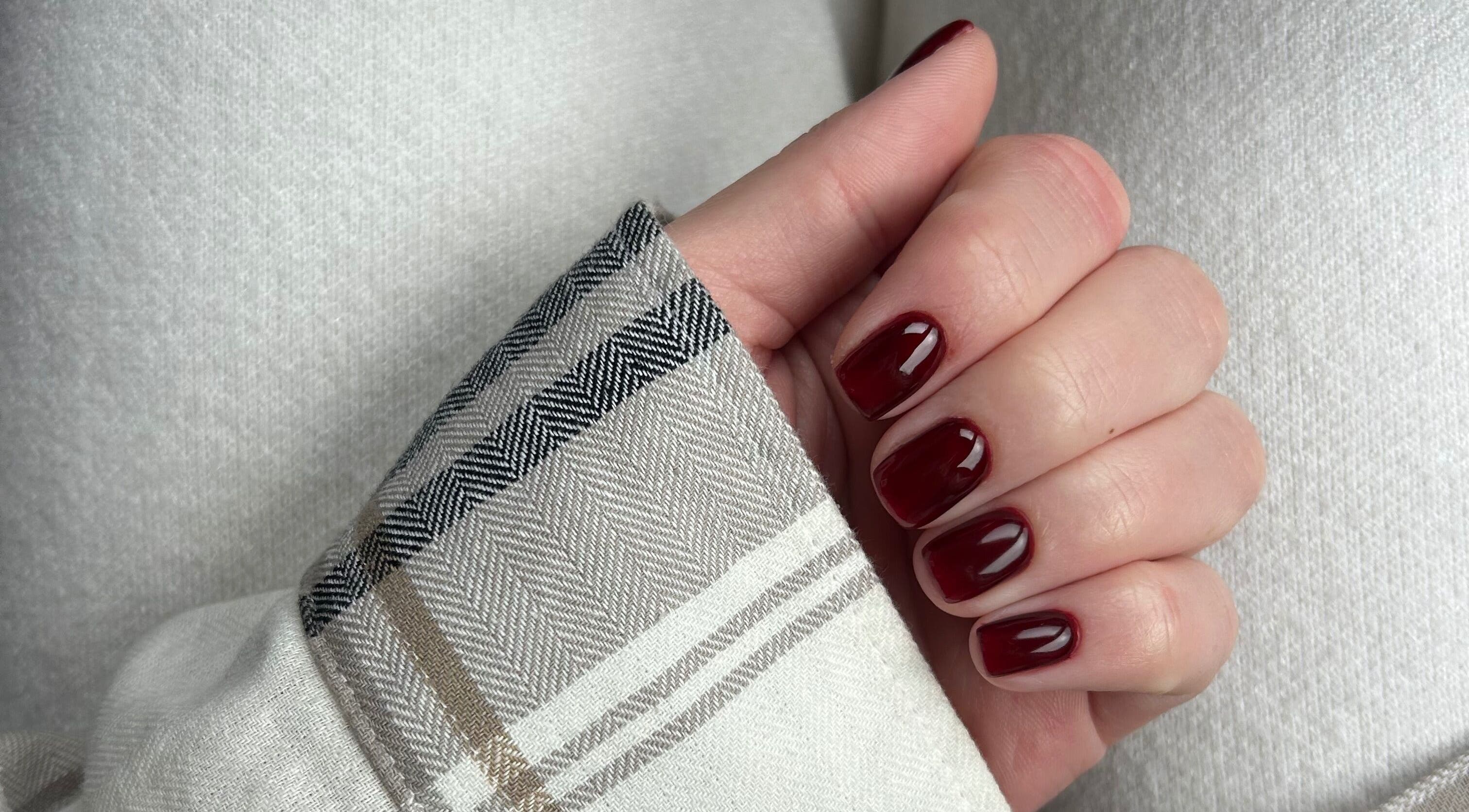 Deep red manicured nails at Manicured By Amelia in Cannock, England, GB. Elegant and stylish finish.