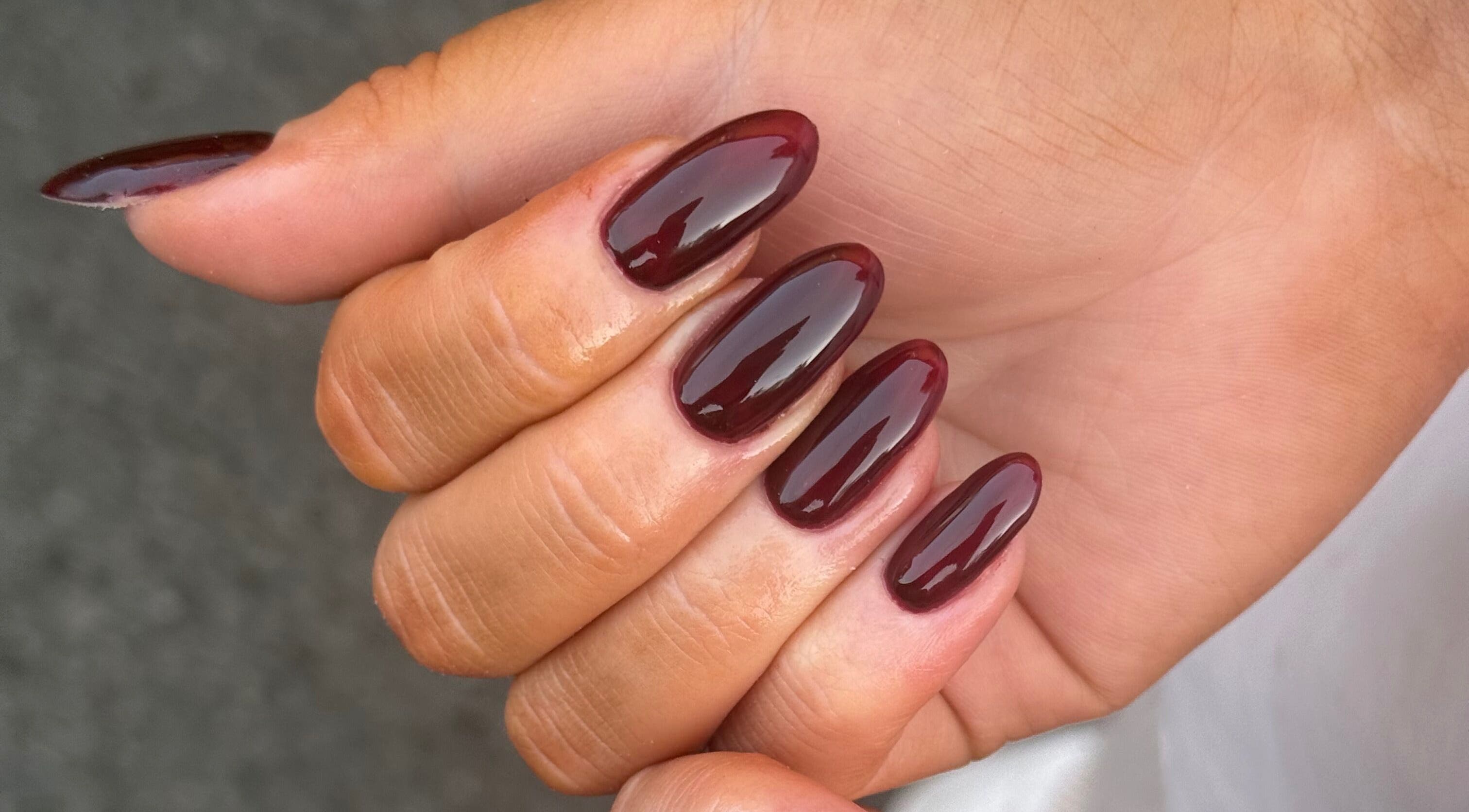 Elegant dark red nails manicured at Manicured By Amelia, Cannock, England, GB.