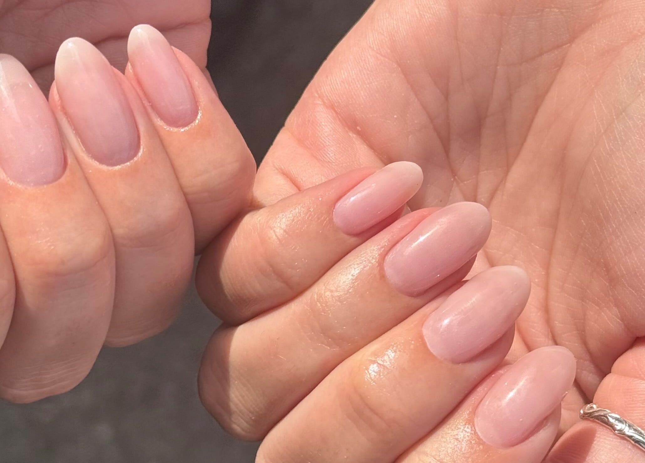 Beautiful manicured nails at Manicured By Amelia, Cannock, England, GB showcasing soft pink polish.