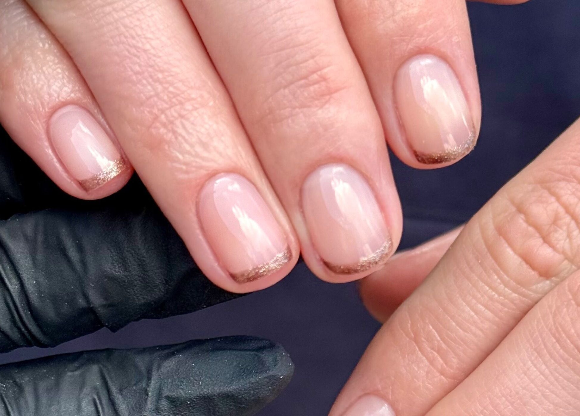 Elegant manicure with gold-tipped nails at Manicured By Amelia, Cannock, England, GB.