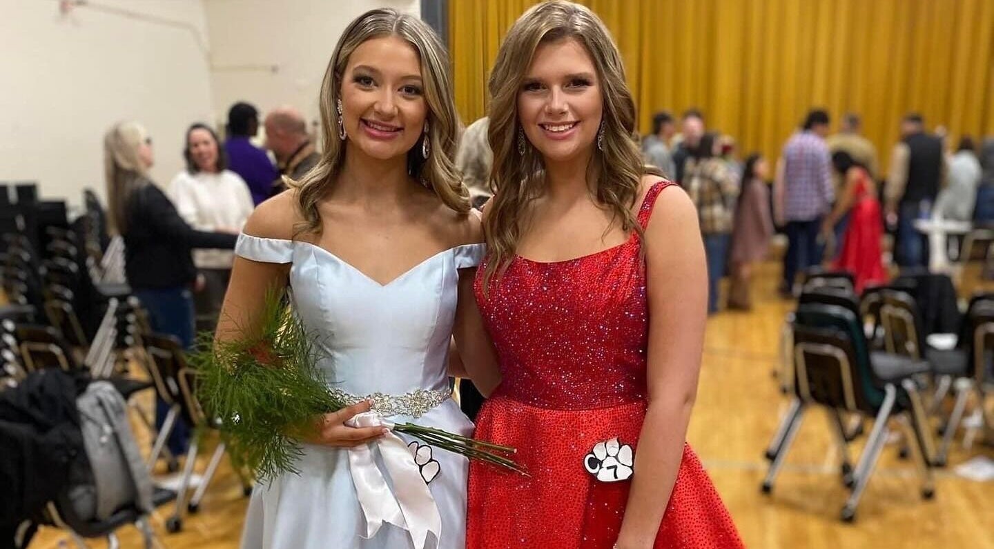 Two women in formal dresses at Bronzed Belles by Bree, LLC, Starr, South Carolina, US event.