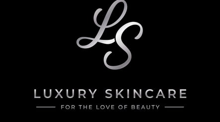 Luxury Skincare Studio logo with silver initials in Bloomington, Minnesota, US.