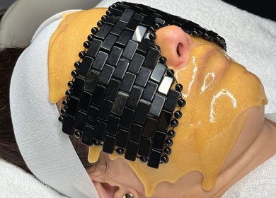 Glistening facial treatment at Luxury Skincare Studio, Bloomington, Minnesota, US. Relax in style and rejuvenate.