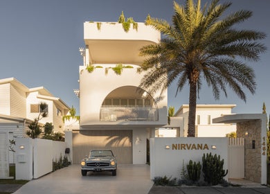 Elegant villa with palm tree at The Sound Studio, Palm Beach, Queensland, AU.