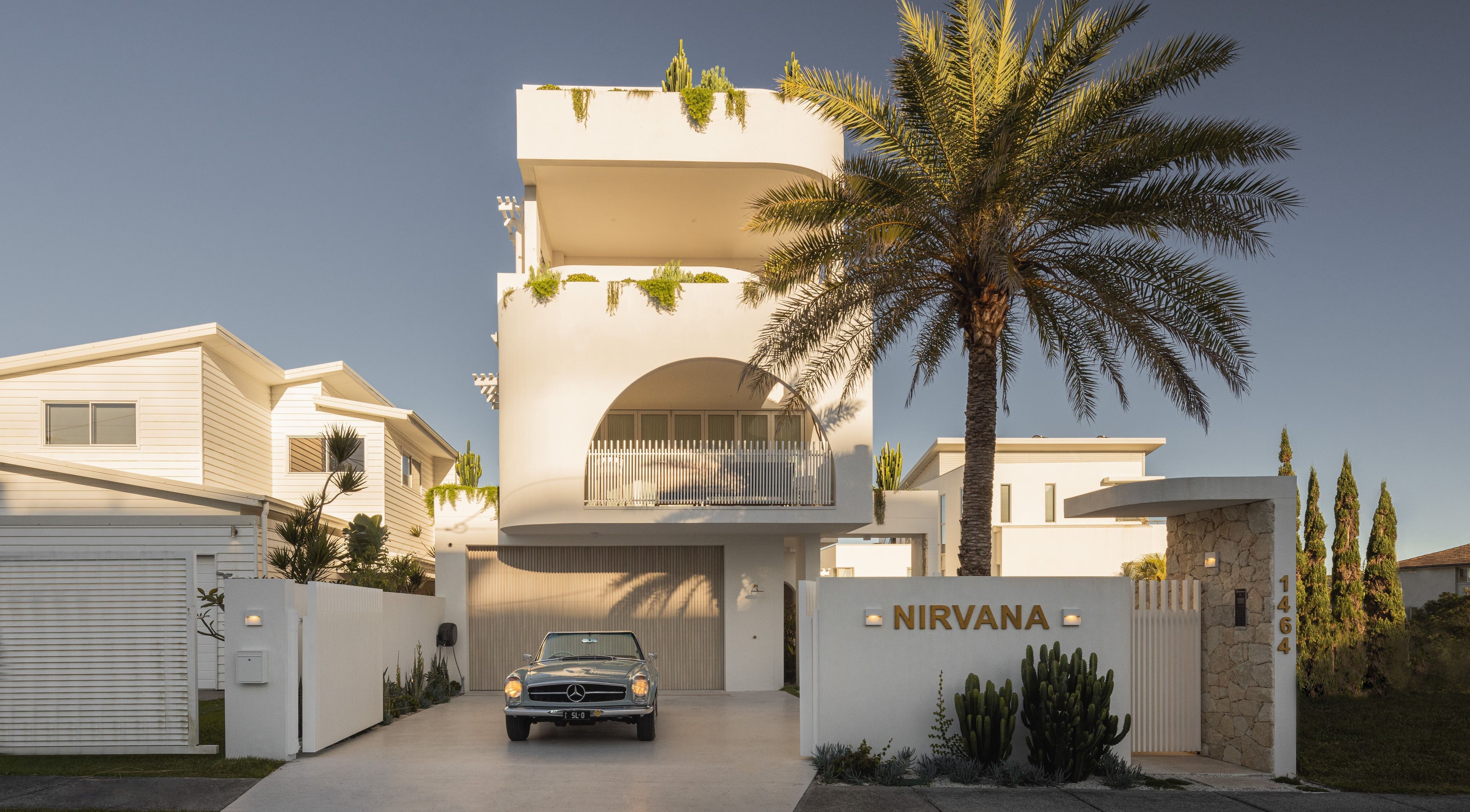 Elegant villa with palm tree at The Sound Studio, Palm Beach, Queensland, AU.
