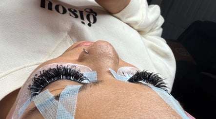 Close-up of eyelash extension process at Rose Lash Studio LLC, Hollywood, Florida, US, showing thick lashes.
