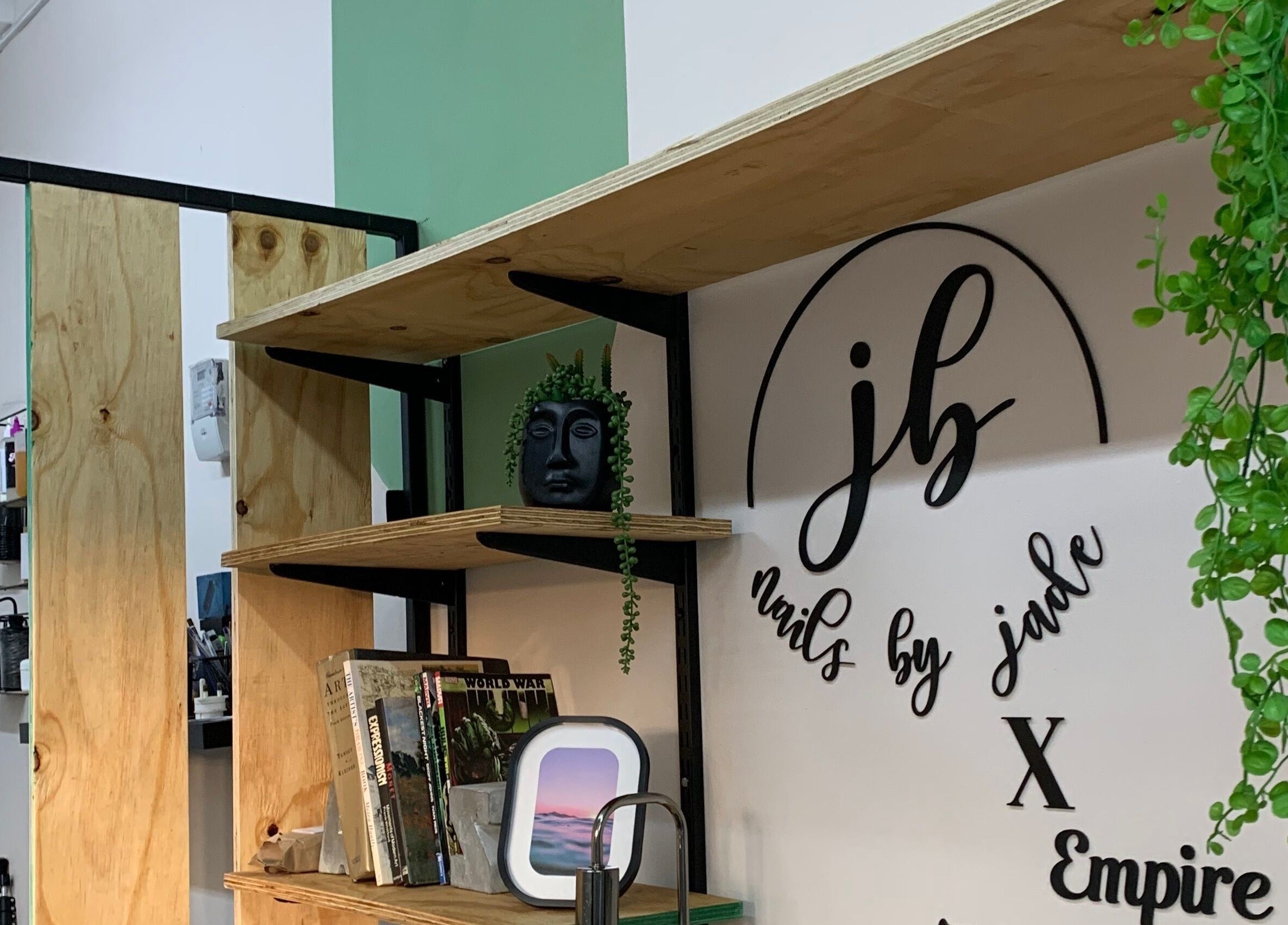 Nails By Jade in Pietermaritzburg features lush greenery and chic decor for a welcoming atmosphere.